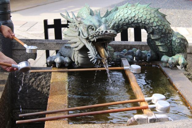A dragon fountain to purify worshipers at a Shinto shrine.