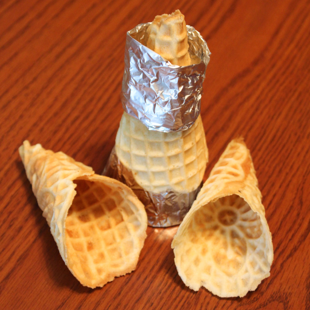 A tinfoil ring around the cones keeps them in place without burning your fingers.